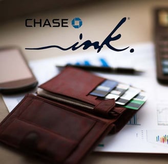 Chase Ink over a wallet and a cell phone