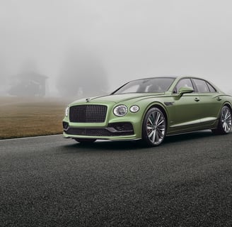 a green bentley flying spur speed