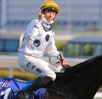 Photo of Hong Kong jockey Vincent Ho on racehorse Golden Sixty