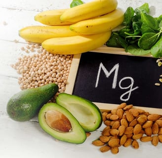 Magnesium-rich foods like leafy greens, nuts, and seeds, showcasing the health benefits of magnesium