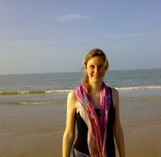 Friendly smiling womam at the beach