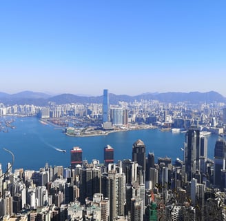 View of Victoria Harbour in Hong Kong with skyscrapers