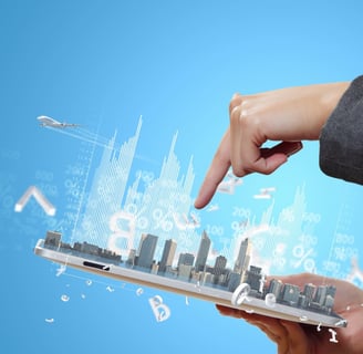 a person's hand holding a laptop computer -digital vs. traditional marketing