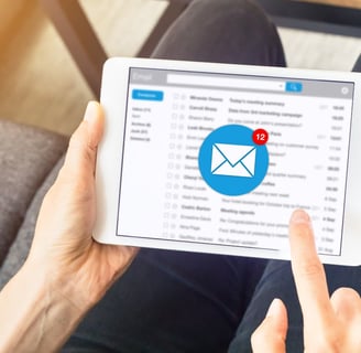 a person holding a tablet with a mailbox on it-Digital marketing Course