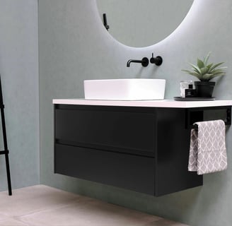 a bathroom with a ladder and a towel rack