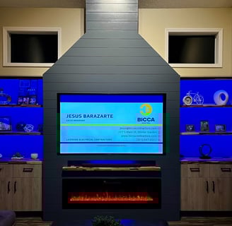 A custom cabinetry build with a television and a fireplace