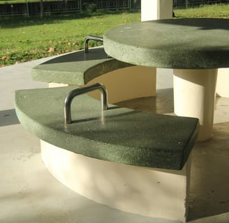 a table with a bench and a bench with a bench and a table with a