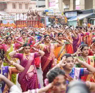 women in maharastrian traditional outfit performing in girgaon gudipadwa shobhayatra 2025