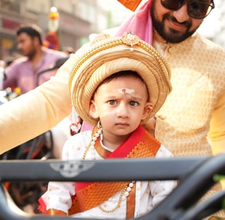 boy kid in maharastrian traditional outfit riding a motorbike in girgaon gudipadwa shobhayatra 2025