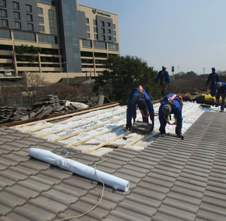 Laying roof tiles for roof installation Project, Environmental Pro Construction