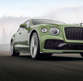 a green bentley rolling shot