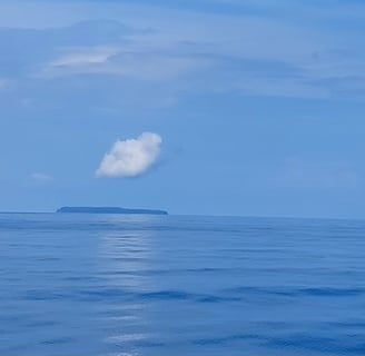 Cano Island seen from distance in a tour with Coral Expeditions Costa Rica 
