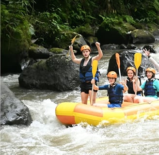 Tropical waterfall view during exciting Ubud Bali rafting tour experience
