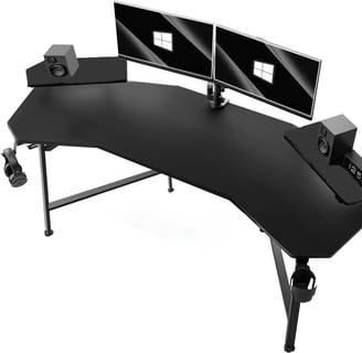 a computer desk with two monitors and a monitor