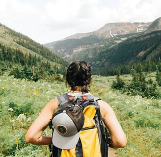 woman hiking by Holly Mandarich