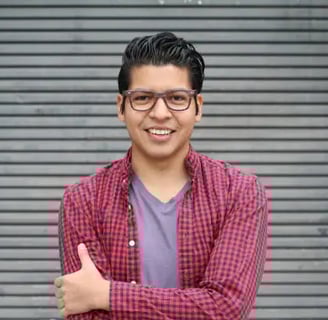a man in a red shirt and glasses