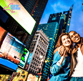 a man and woman taking a selfie in the city