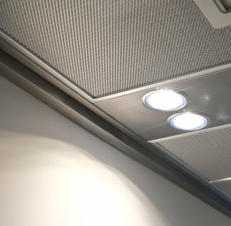 a ceiling fan with three lights and a ceiling fan