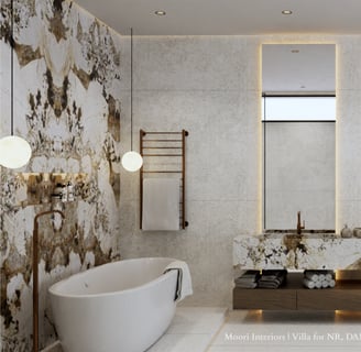 Modern bathroom with double marble vanities, illuminated mirrors, a tub and a heated towel rack