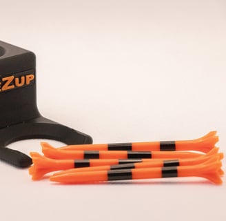 TeeZUP club attachment tee assist tool with three orange-striped tees