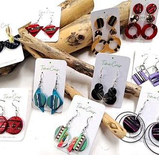 a bunch of earrings with earrings and earrings