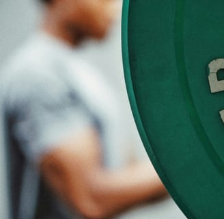 Man with weight in the background