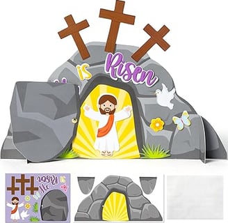 a paper cutout of a jesus's empty tomb