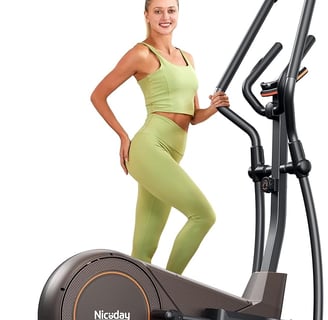 a woman in a green outfit is standing on a stationary stationary bike