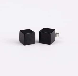 a pair of black pearl stud earring