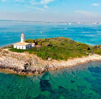 Panoramic shot of Alcanada Island, a key stop on Balea Charters boat tours in Mallorca