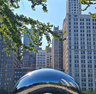 a large metal sculpture of a bean