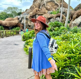 Karen Amundson in front of the "Tree of Life" inside Disney's Animal Kingdom® Park.
