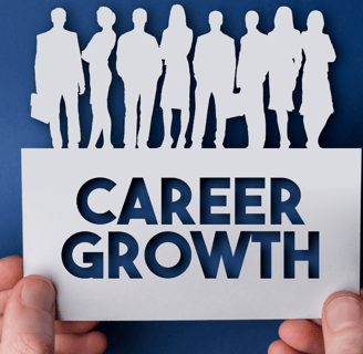 a person holding a paper cutout of a paper cutout of a career