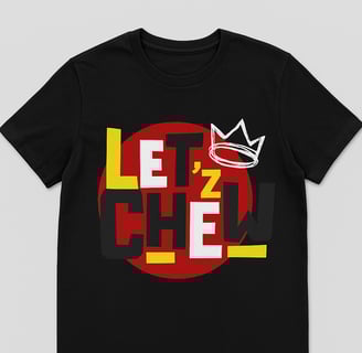 a black t - shirt with a crown on it