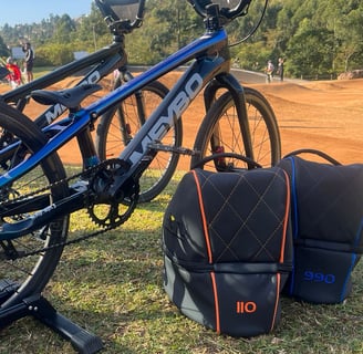 Remy Luxury Helmet Bag placed trackside, capturing the motorsport-inspired design in its natural 