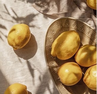 Yellow lemons on a table