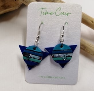 a pair of earrings with a blue and green striped design