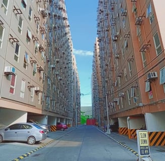 a street scene with a car parked in front of a building