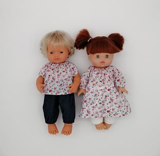 Miniland doll and Minikane doll dressed in handmade outfits