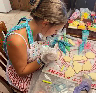 A Real in the moment photo of what it looks like to decorate these cookies