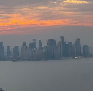 Sky line view of Doha, Qatar at sunset