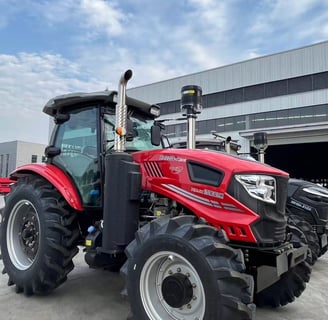 a red tractor with a large wheel on it
