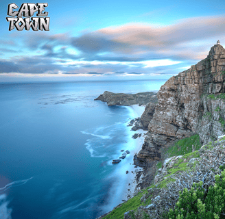 a cliff side view of a cliff with a view of the ocean
