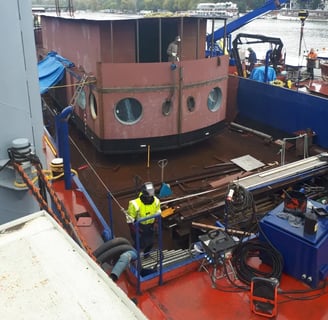 Portholes in a Barge building yard