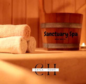 Cayla Henri Wax Melts: Towels and towels are on a table in a wooden bucket
