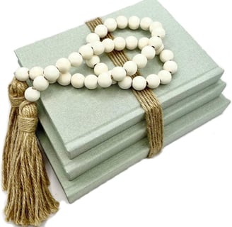 neutral colored home decor, book table decor