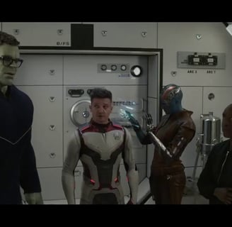 Avengers: Endgame scene with Professor Hulk explaining quantum concepts to the team.