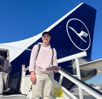 a man standing on a ramp of a plane