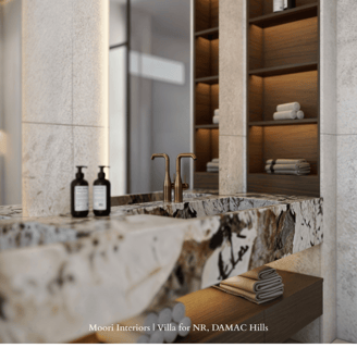 A modern bathroom vanity with a unique marble pattern and a large, well-lit mirror.