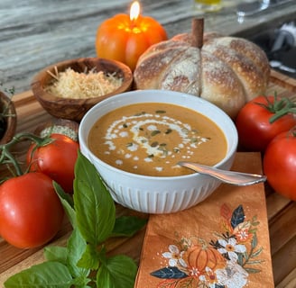Creamy pumpkin soup with pumpkin shaped sourdough bread